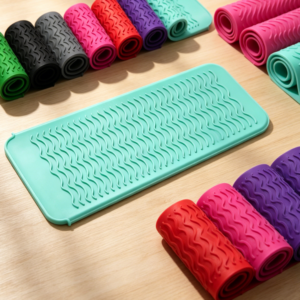 Heat-resistant silicone mat for hair styling tools; safe storage for curling irons and straighteners
